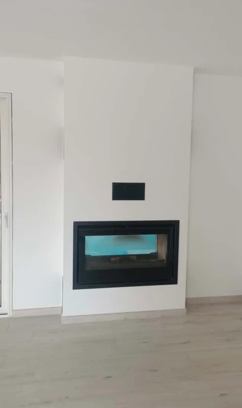 Installation d'un insert à bois par Chenais Cheminées à à Champagné